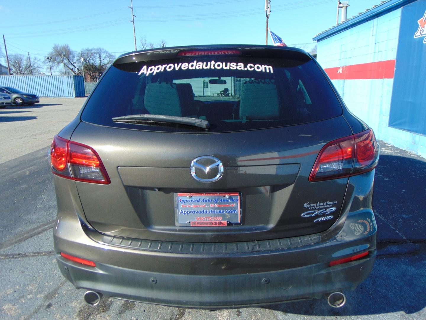 2015 Black MAZDA CX-9 (JM3TB3CA7F0) with an V6 3.7 Liter engine, Auto, 6-Spd Sportshift transmission, located at 2105 Dixie Hwy, Louisville, KY, 40210, (502) 772-3333, 38.220932, -85.795441 - Photo#17